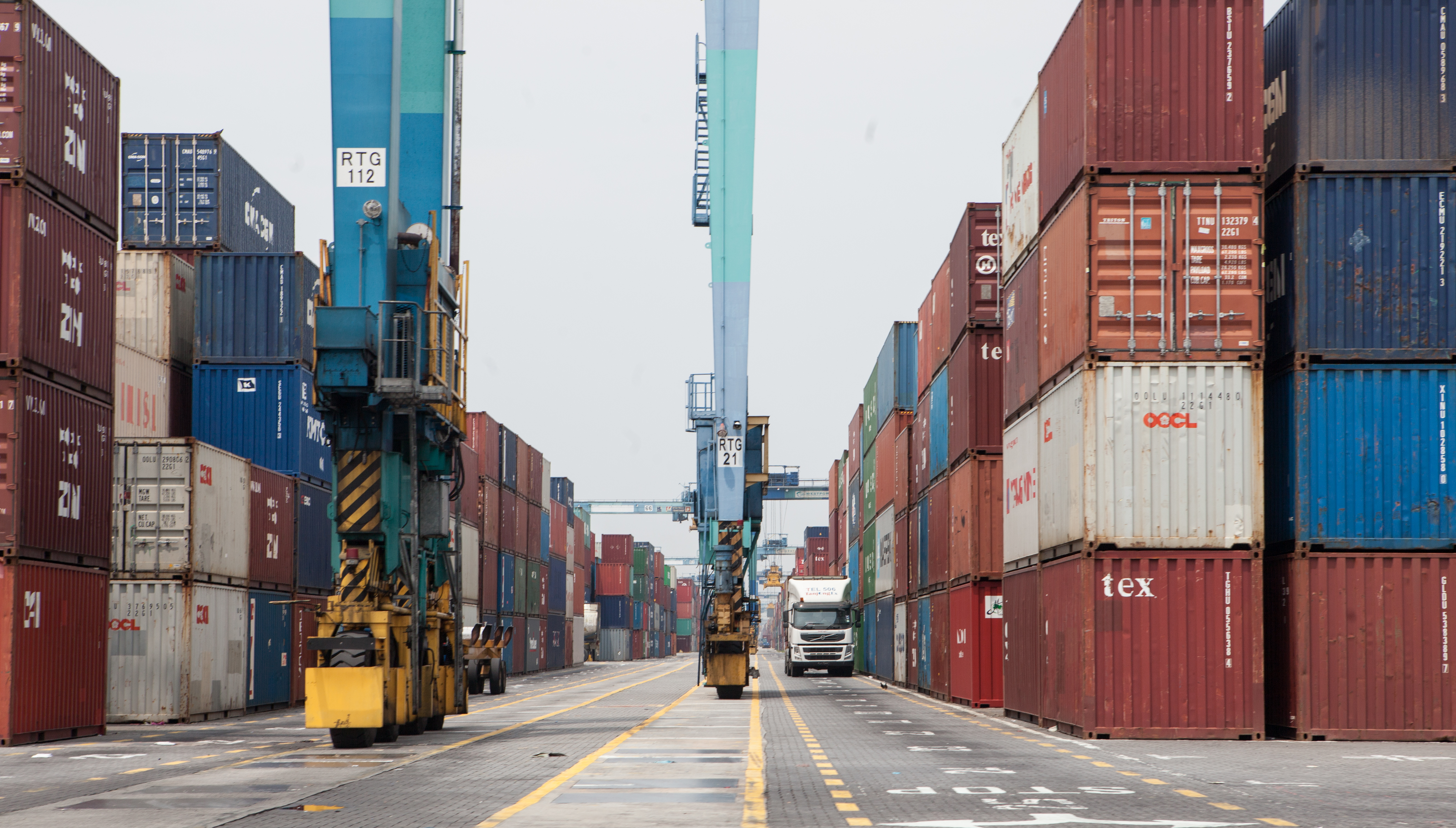 Japan's exports snap four-month slump as weak yen offsets US tariff hit
